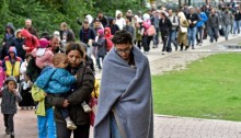 Migrants at a train station in Dortmund, Germany. [Photo Credit Times of Israel/AP Photo/Martin Meissner]