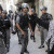 Israeli police block a Palestinian woman's access to the Haram al-Sharif/Temple Mount (Photo Credit Al-Monitor/Reuters-Ammar Awad)
