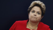 Brazil's President Dilma Rousseff reacts during a news conference on the 2014 World Cup in Brasilia, July 14, 2014. Rousseff said Brazil defeated pessimism about its ability to host the World Cup by staging one of the best tournaments ever. REUTERS/Ueslei Marcelino (BRAZIL - Tags: POLITICS SPORT SOCCER WORLD CUP)