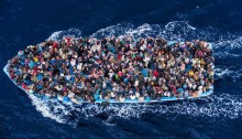 June 7, 2014 - Mediterranean Sea / Italy: Italian navy rescues asylum seekers traveling by boat off the coast of Africa. More than 2,000 migrants jammed in 25 boats arrived in Italy June 12 (Massimo Sestini/Polaris)