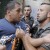 An Israeli police officer detains a Palestinian protester in East Jerusalem [Photo Credit: Reuters/Ammar Awad]